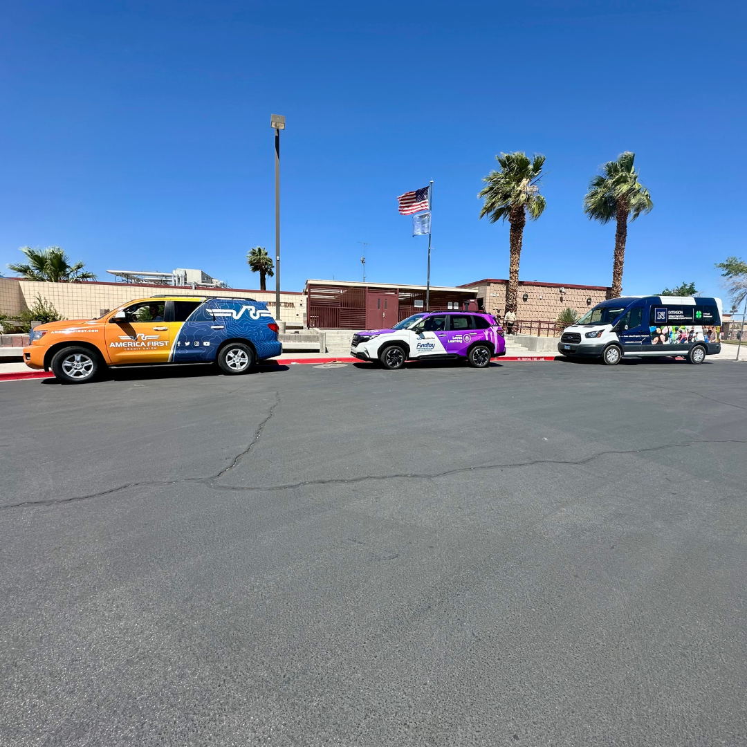 Cars line up outside a school to deliver food