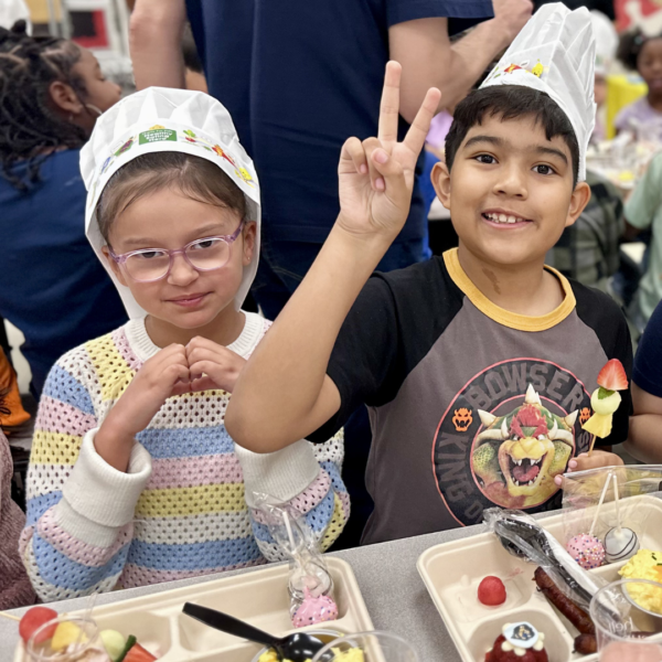 Fay Herron Elementary School Student with Peace Sign and Heart