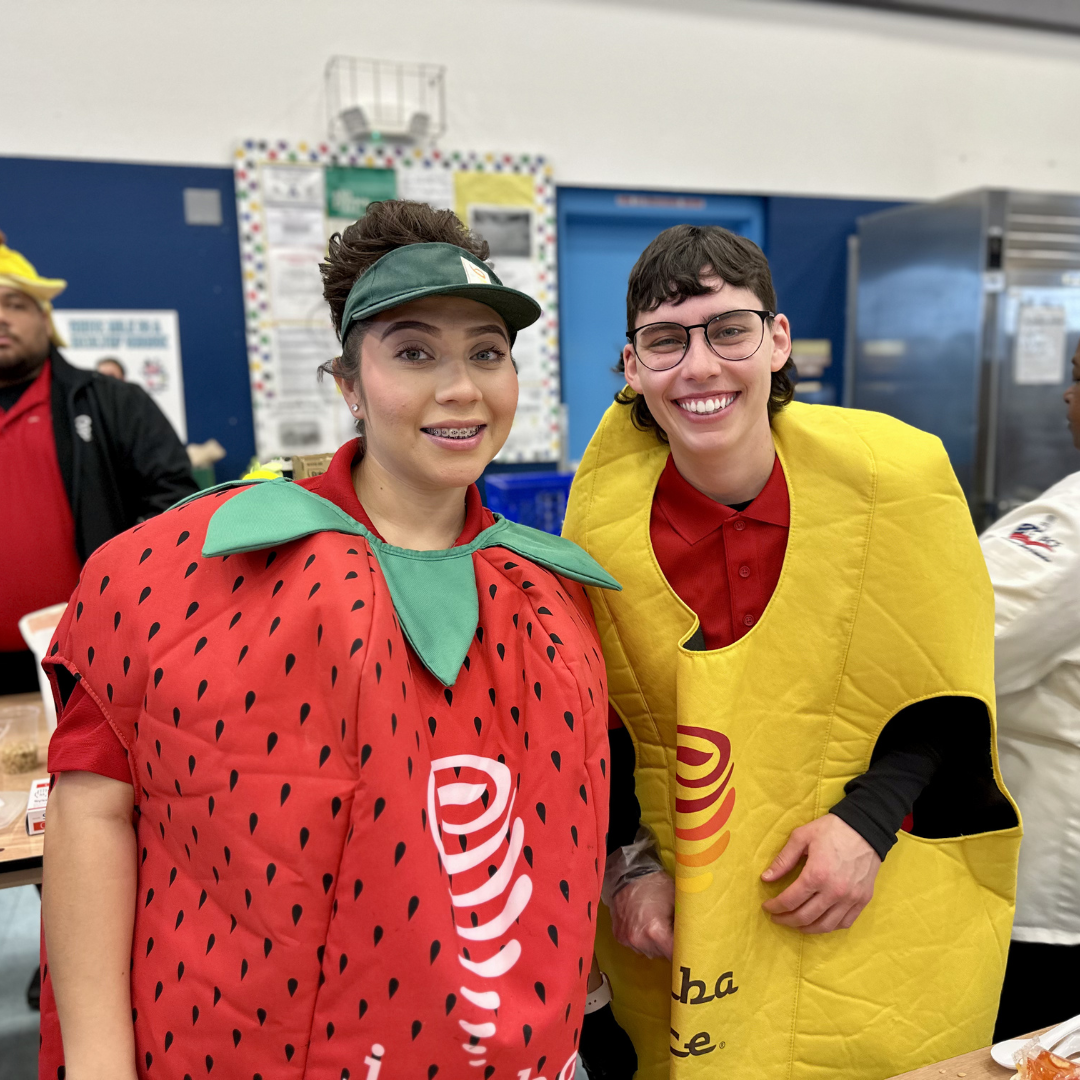 Jamba Juice team members dressed as a strawberry and banana