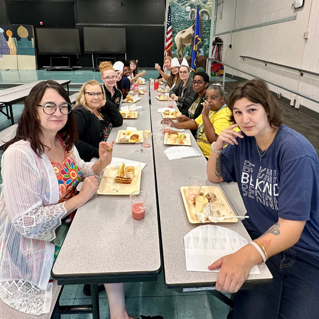 Teachers at Halle Hewetson eat breakfast